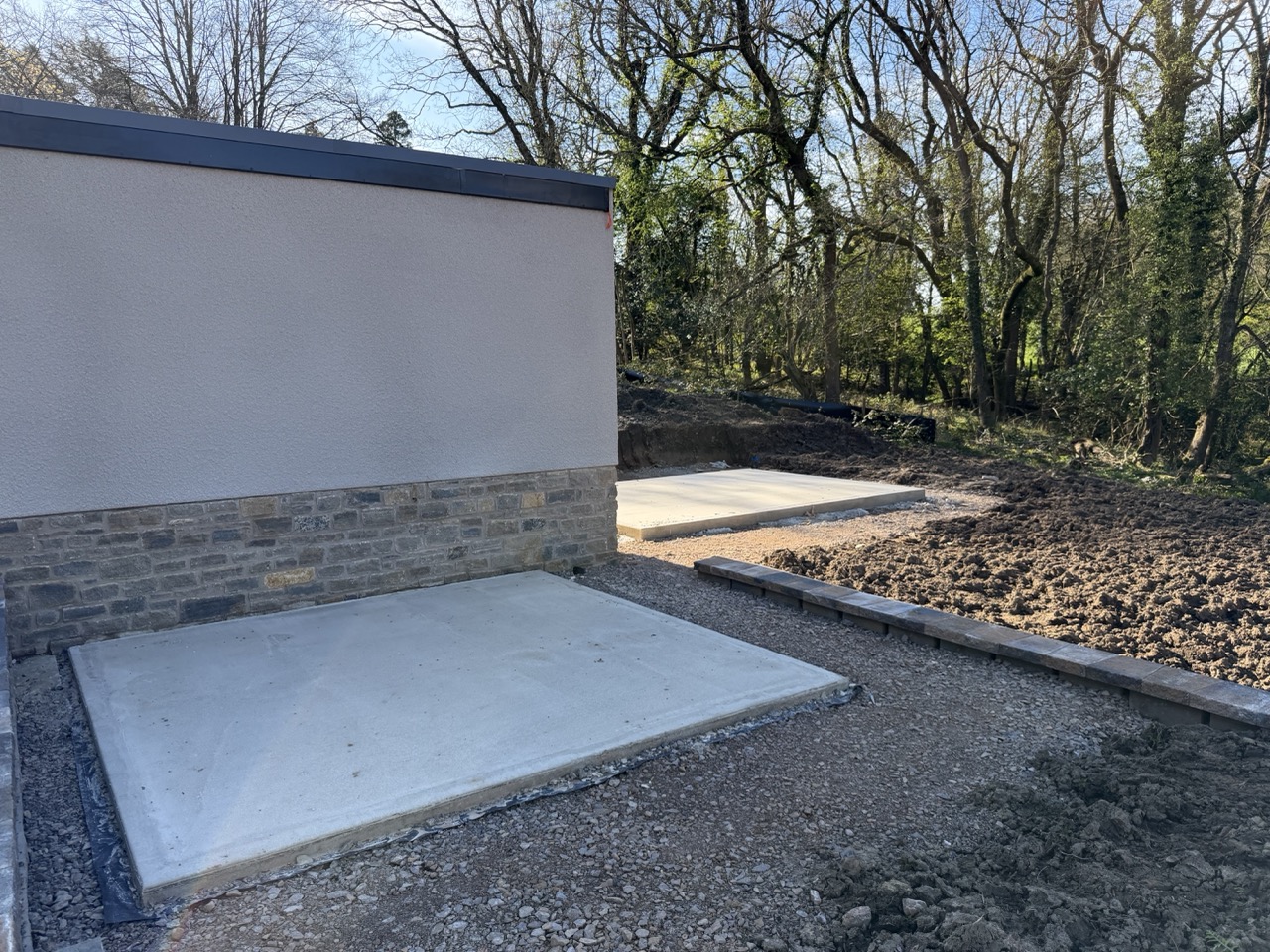 Plot 12's hot tub and garden office slabs in - just 12 short weeks or so now before moving in date!
