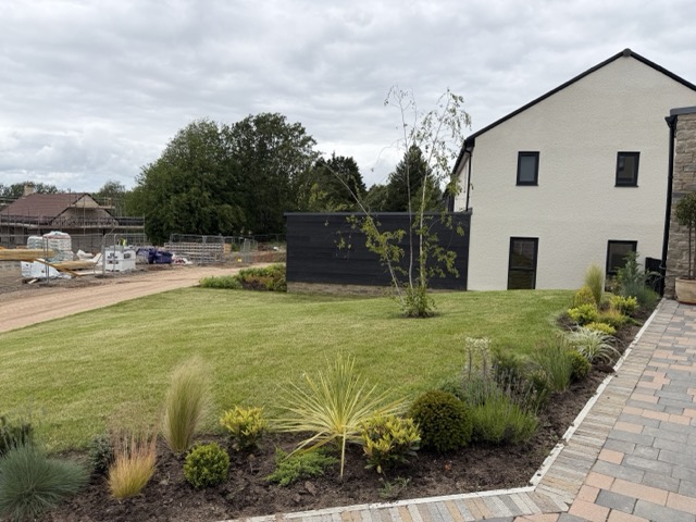 View from Plot 20's drive across to Plot 19 with Plot 8 making progress in the distance