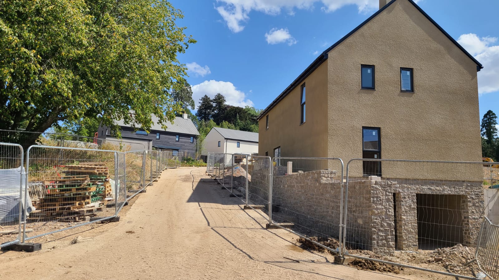 Plot 8 also starting to take shape with a beautiful stone wall wrapping around it